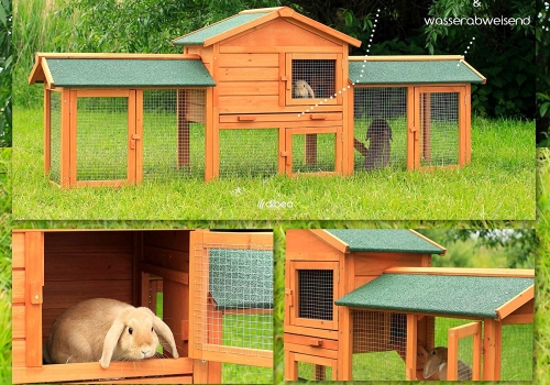 Enclos pour lapins fait en bois, installé dans un jardin